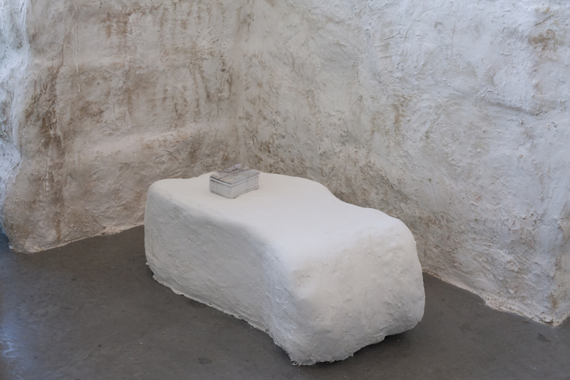 Untitled, 2013, variable size, hay bales, plaster, chalk-board paint, chalk, video, postcards