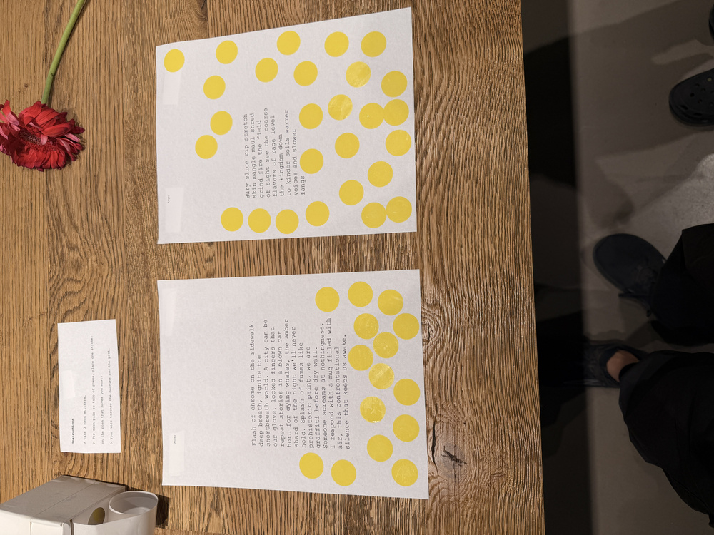 Printed poem sheets with audience votes