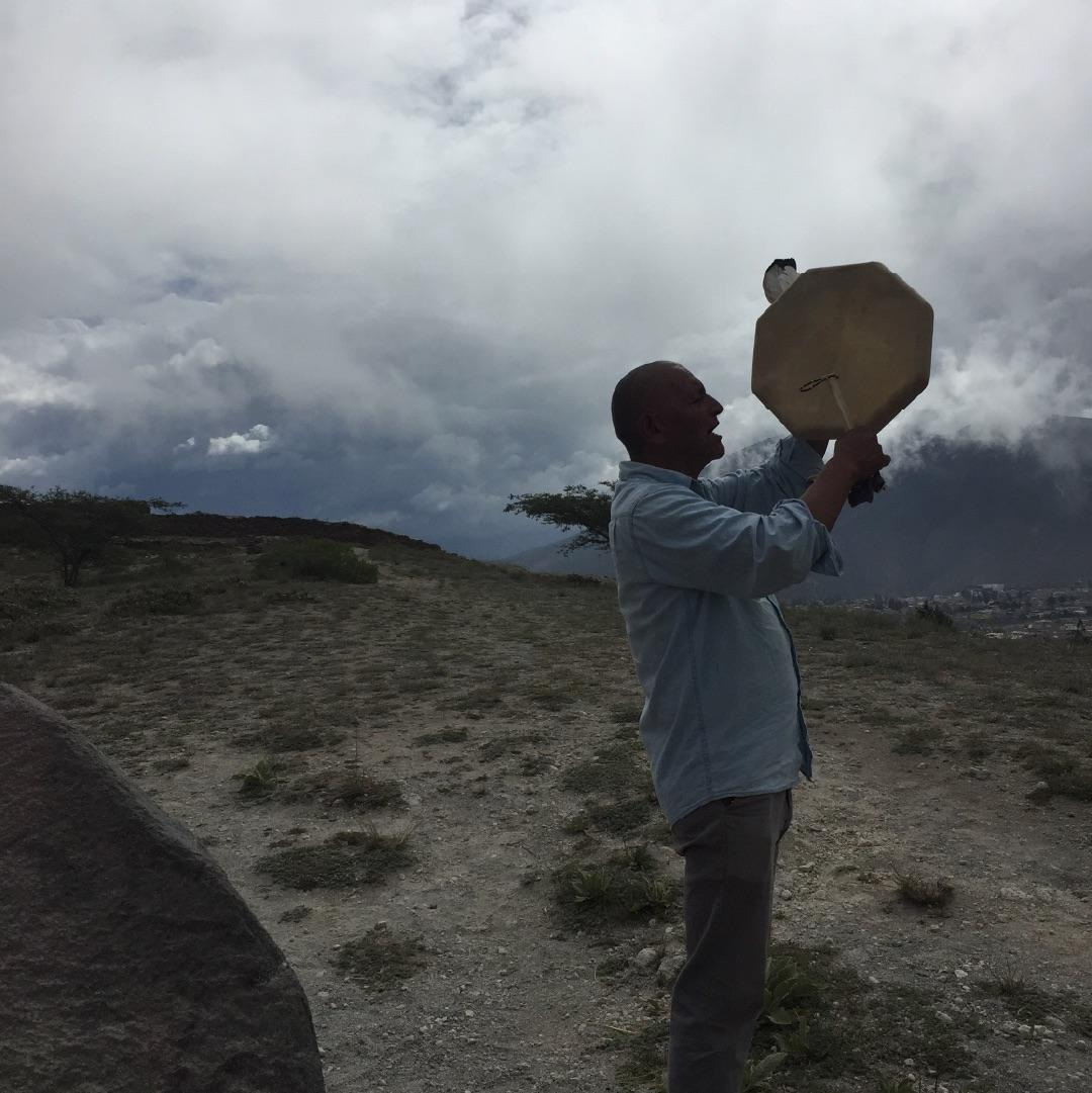 Yachak Alberto during a ceremony in an archeological site close to the middle of the world.