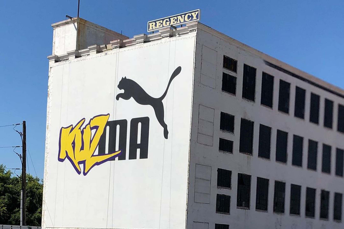 Kuzma puma outlet sign