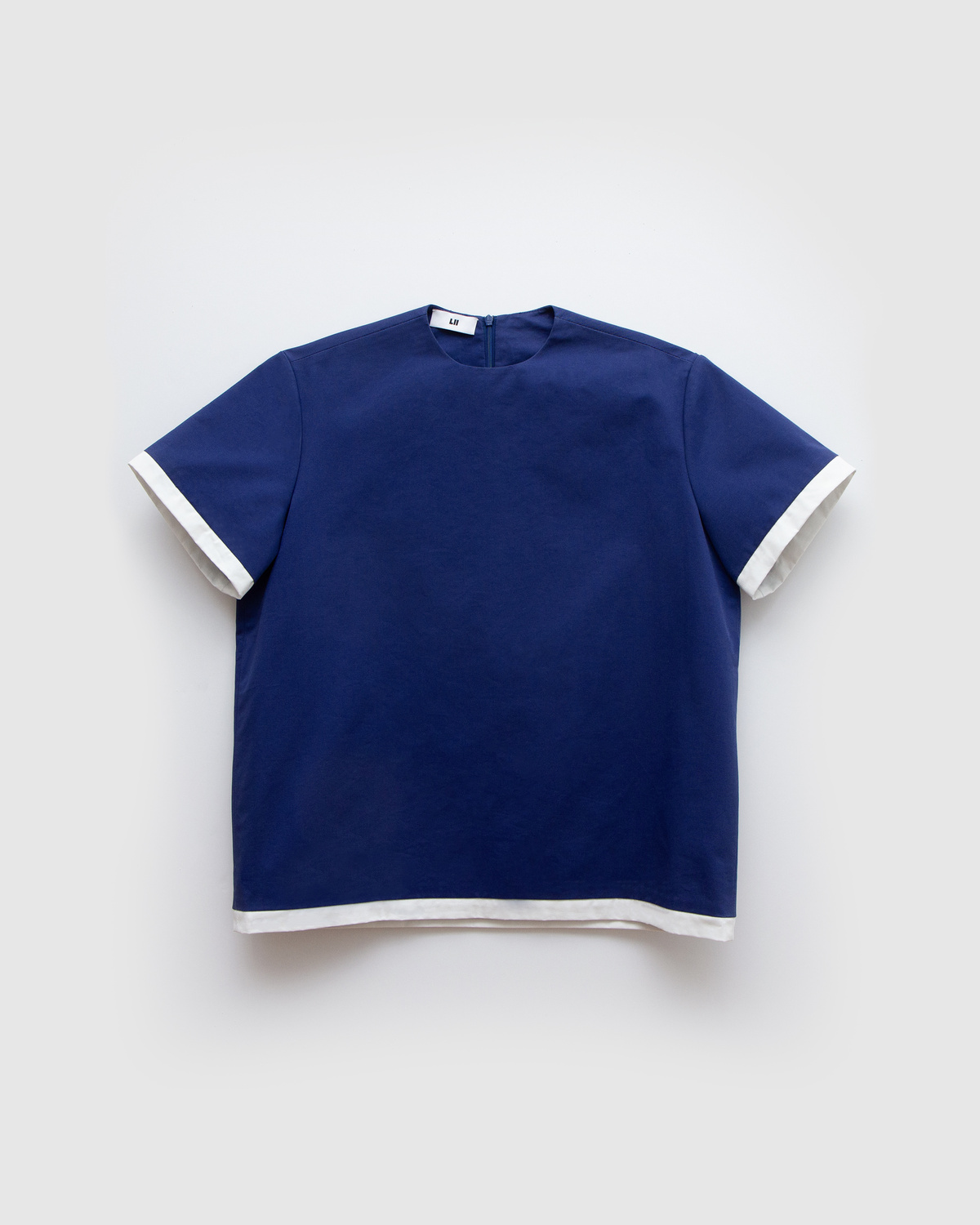 SHOP — LII