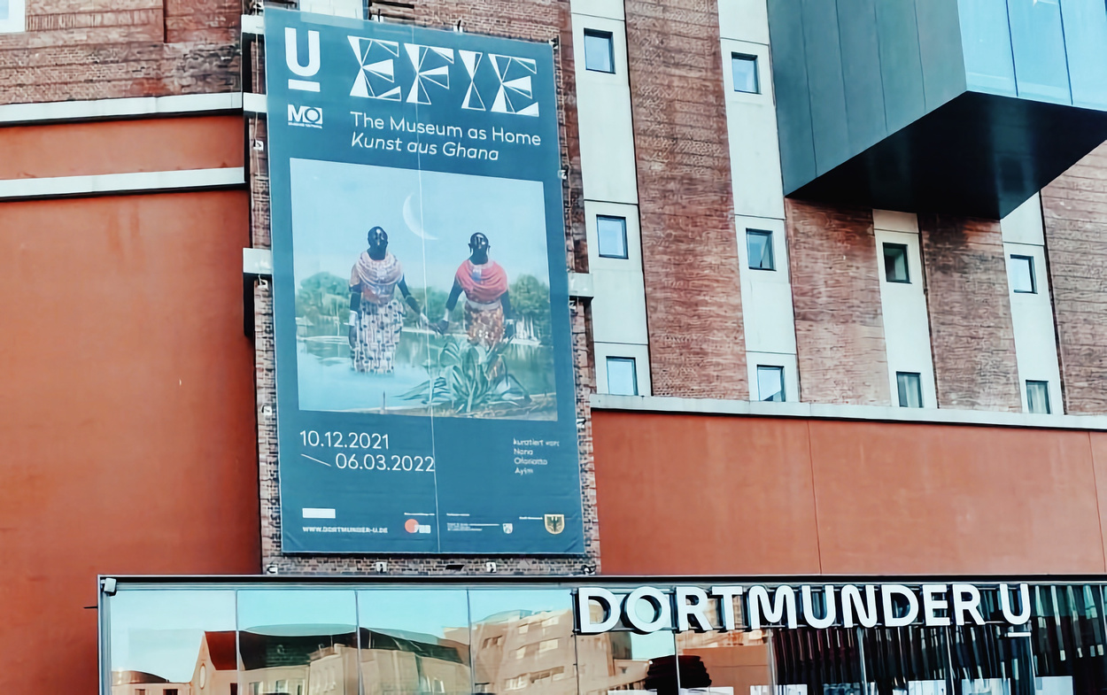 Efie: Museum as Home poster featuring "Hu M'ani So Ma Me" from Spiritual Migration series at Museum Ostwall Entrance