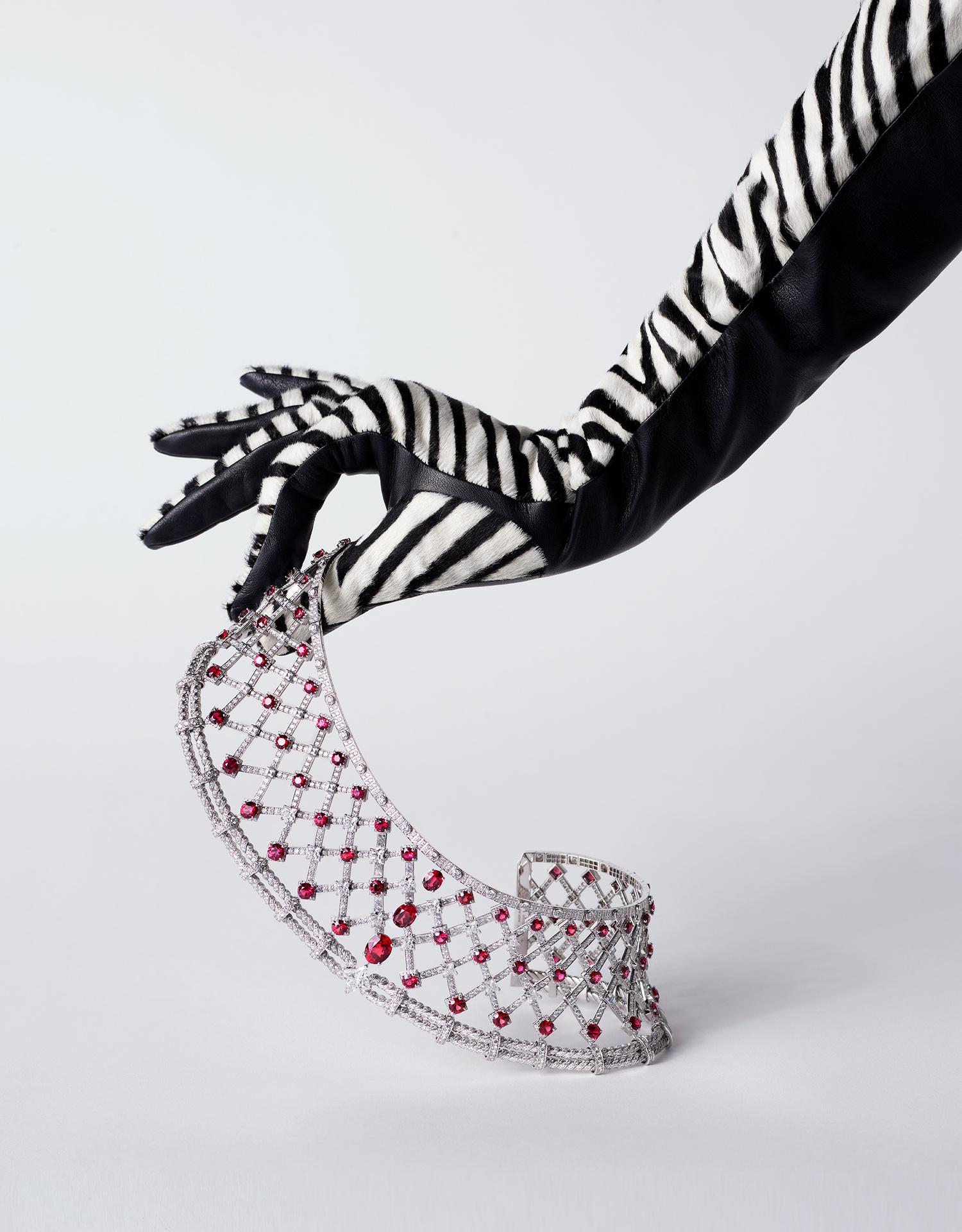 KMA photographer Isabelle Bonjean shoots model wearing animal print glove hold Louis Vuitton Necklace for Citizen K Magazine   