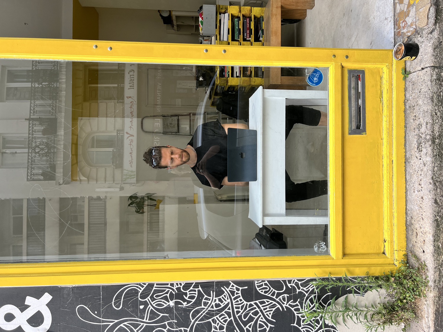 Carnation.exe performance installation with printed poems displayed side by side