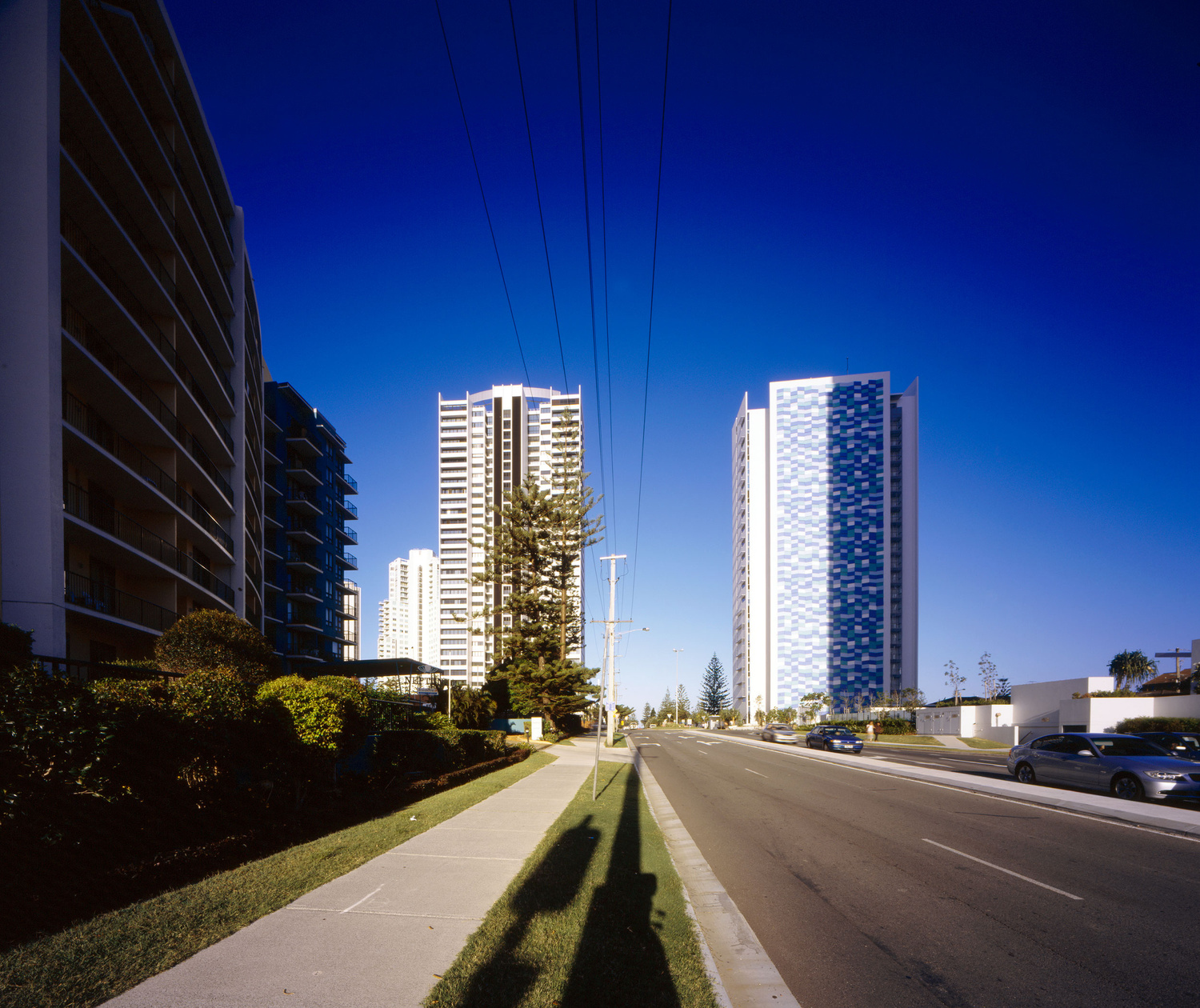 Street view of two contemporary towers in Broadbeach, featuring BDA designed 'Ocean Pacific'.