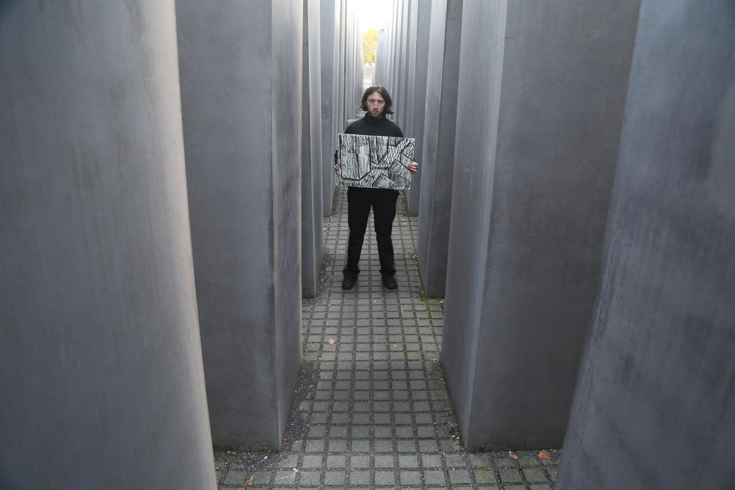 Eli with artwork in the memorial to the murdered Jews of Europe