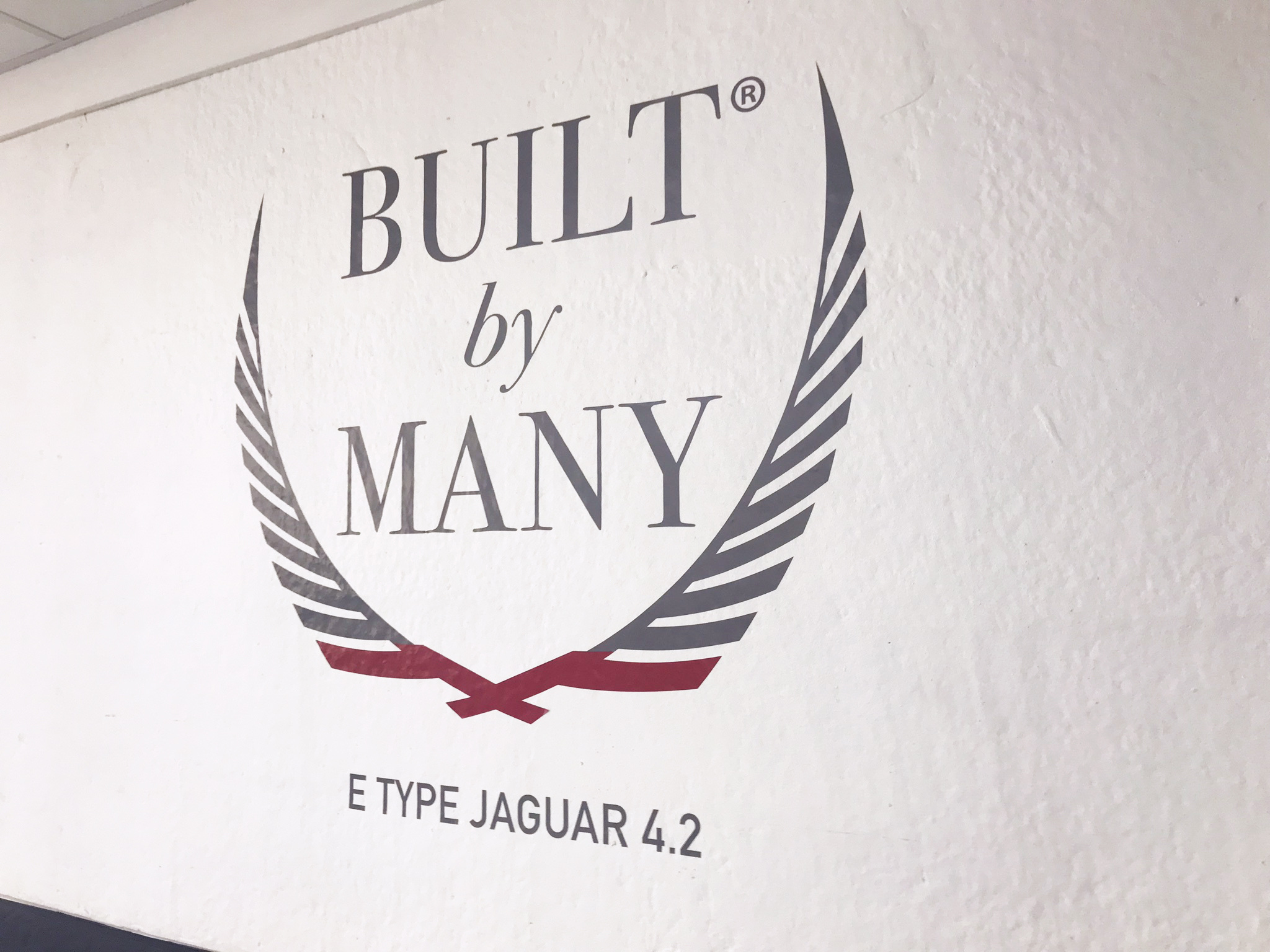 Built By Many logo on studio wall