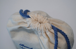 puckered drawstring opening of bag