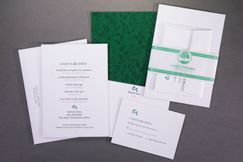 Carina & Chris midsummer wedding invitationLetterpress in gray, green and a light gray tint for the midsummer pole, the back of the duplexed invitation dark green letterpress on green Colorplan paper. Bellyband digitally printed on white vellum.Paper and envelopes Savoy in brilliant white
