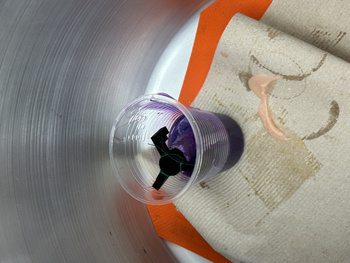 my mold submerged in the mixture (dyed it purple)