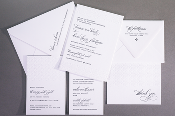 Lauren & Kevin wedding invitation for Orange Blossom Special EventsBlack letterpress and blind impression.Paper and envelopes Lettra in fluorescent white