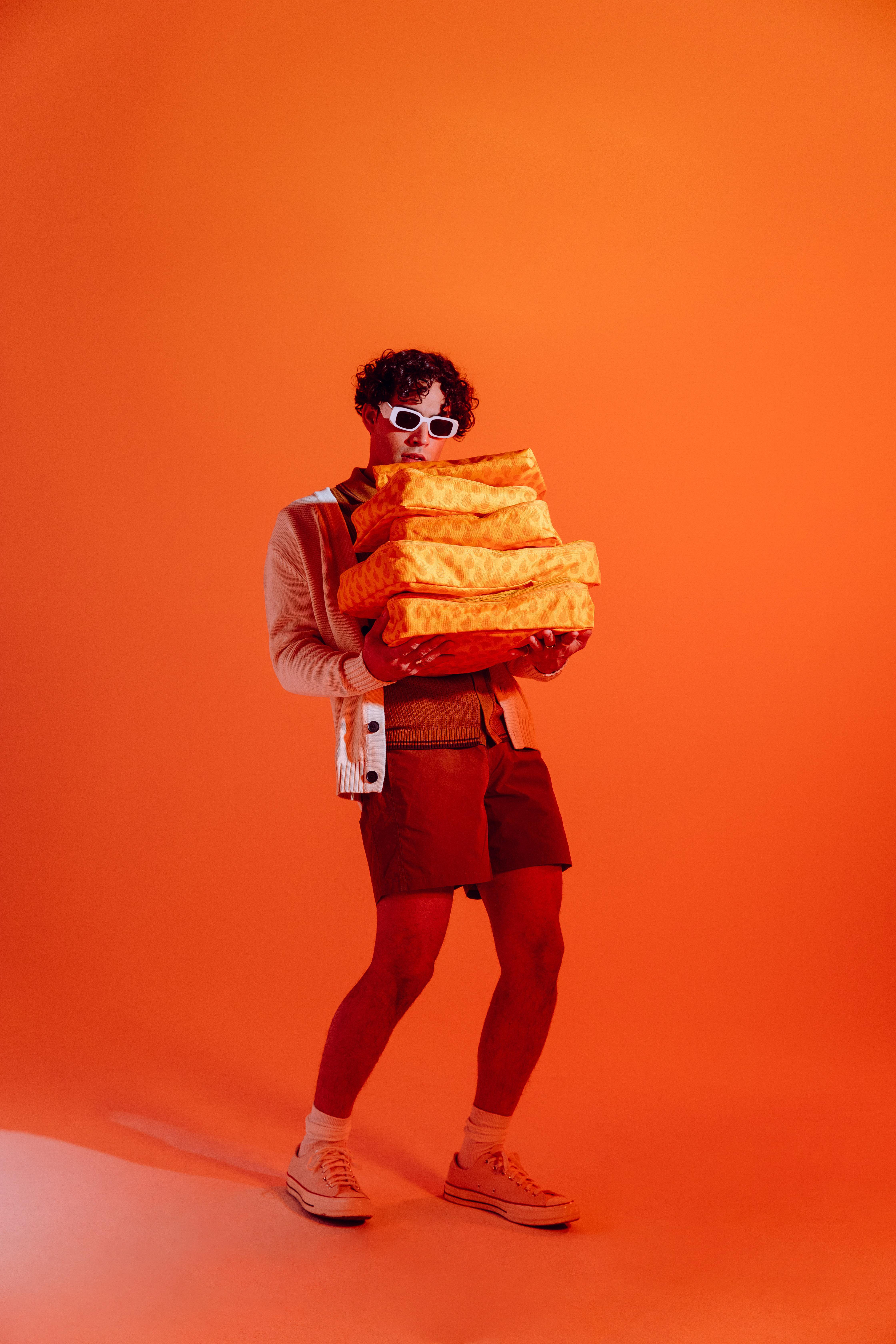 Shop Taco Bell x Calpak Luggage Collaboration: New Duffels, Carry-on