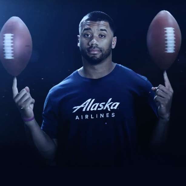 Alaska Airlines to grant early boarding to guests wearing a Russell Wilson  jersey